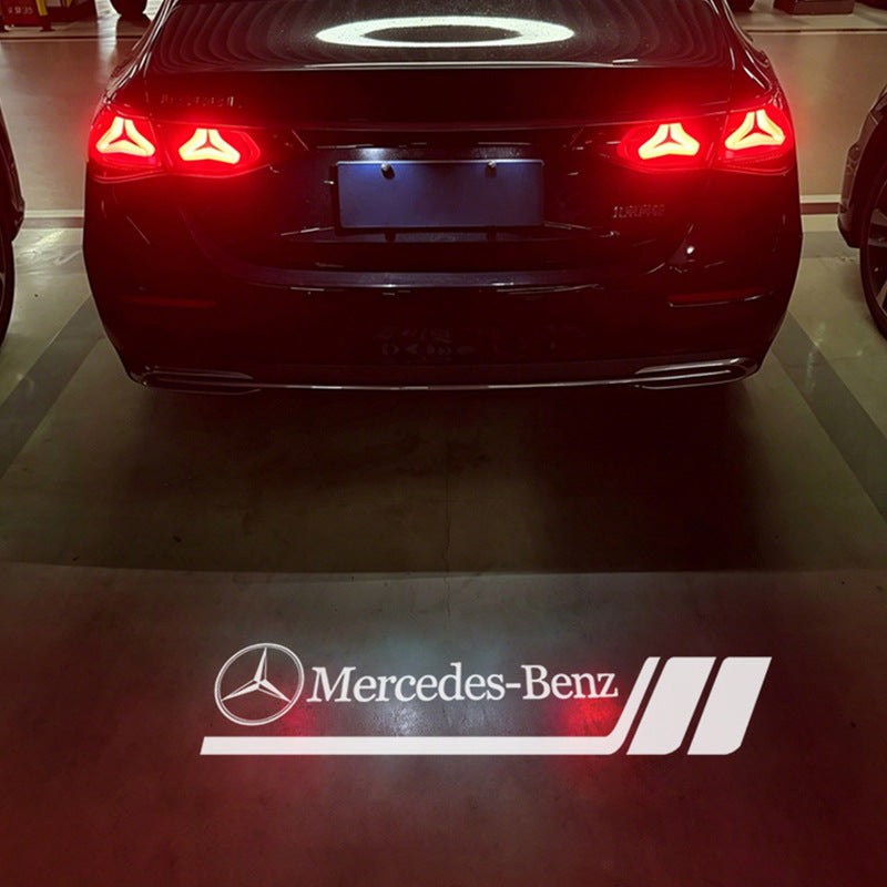 Style 5 AMG sport badge pattern projected by Mercedes-Benz license plate projector light - LumeAuto
