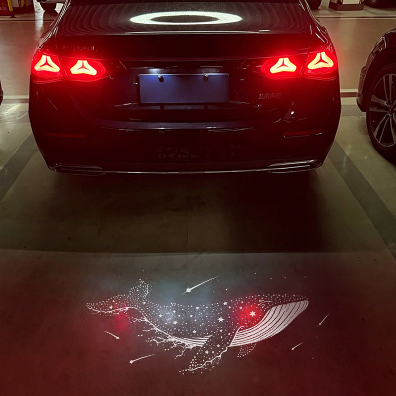 Style 10 whale pattern projected by Mercedes-Benz license plate projector light - LumeAuto